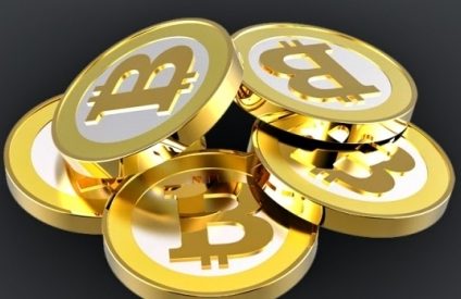Cea mai populară criptomonedă, bitcoin, atinge un nou record, de peste 52.900 de dolari