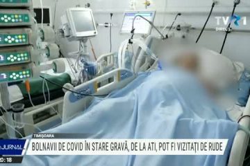 Vizitele în secțiile de terapie intensivă COVID, în condiții stricte. Aparţinătorul este însoţit și ajutat la echiparea cu combinezonul de protecție