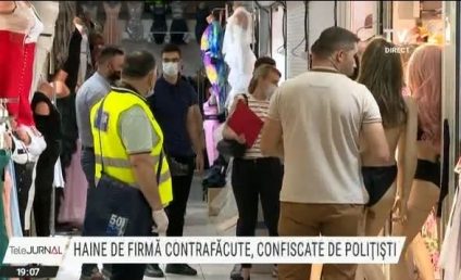 Zeci de saci cu haine contrafăcute din IDM Basarab au fost confiscate de polițiști