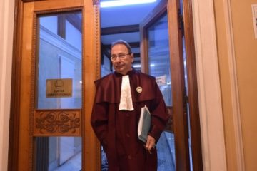 Legea în baza căreia CNSAS a decis că Mugur Isărescu a colaborat cu Securitatea, declarată neconstituțională de CCR