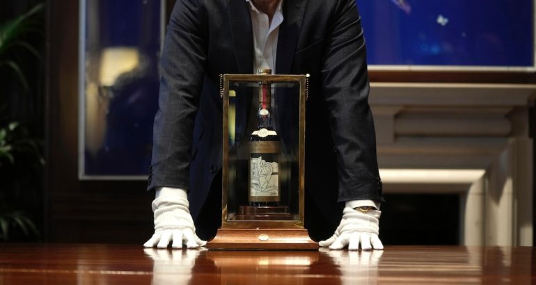 cheers!-a-bottle-of-scotch-whisky-sells-for-a-record-$2.7-million-at-auction-–-abc-news