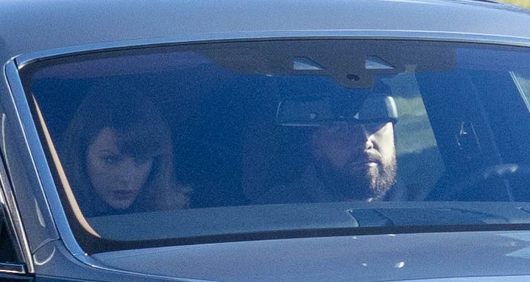 travis-kelce-and-taylor-swift-enjoy-a-new-year’s-day-drive-the-morning-after-their-passionate-kiss-at-a-glitzy-–-daily-mail