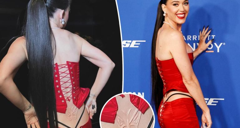 katy-perry-flashes-lingerie-(and-lower-back-‘tattoo’)-in-daring-lace-up-look-at-billboard-women-in-music-2024-–-page-six