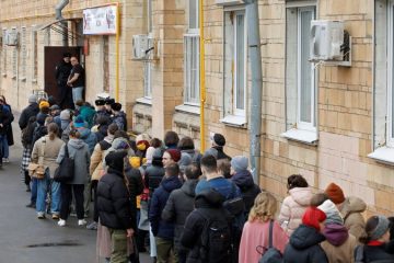 Russia sees polling station protests as Putin set to extend long rule – CNN